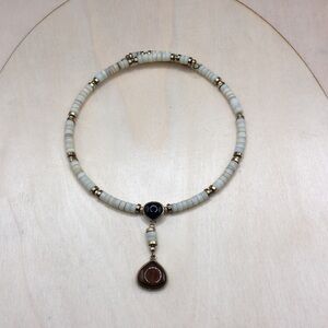 Artisan heishi beads boho style choker memory wire necklace.